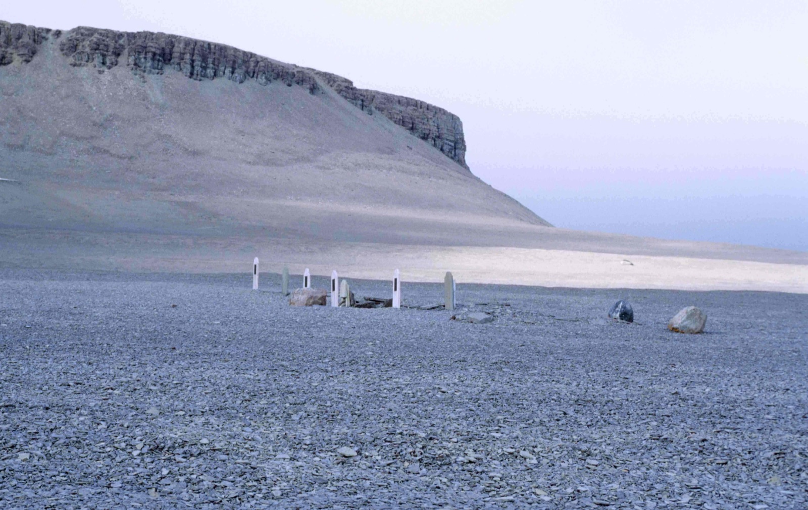 The graves of three of Franklin's crewmen on Beechey Island — the expedition's first winter camp, and its first casualties. Photo: Ansgar Walk, CC BY-SA 2.5, via Wikimedia Commons.